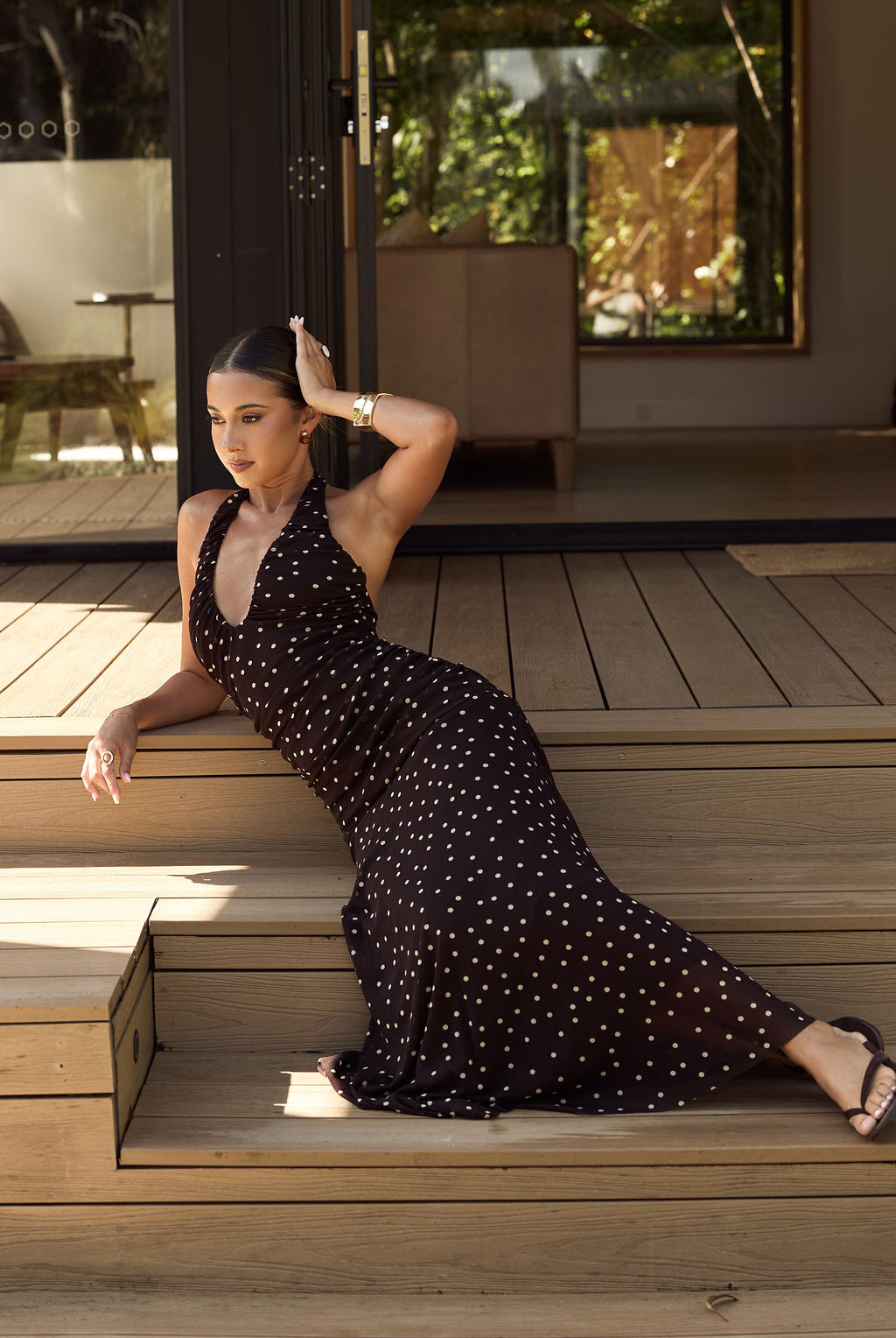 Coco Muse Mesh Dress — chocolate polka dot halter maxi dress lifestyle seated shot — Little JC Boutique