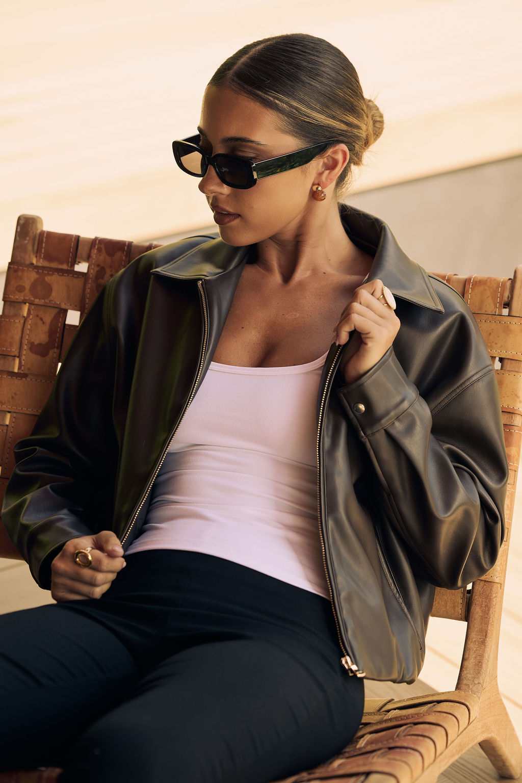 Chocolate brown faux leather jacket back view with elasticated hem — Little JC Boutique